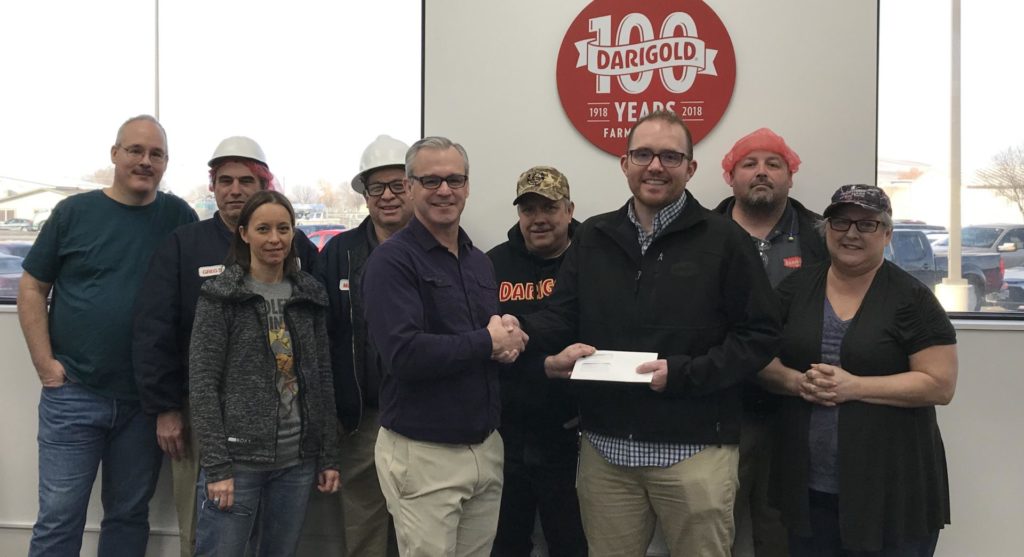 Darigold's energy teams accepts a rebate check for $45,000. Left to Right: John Kohis, Greg Lommers, Hannah Hull, Martin Alaniz, Troy Berglund, Tom Rouleau, Travis Street, Andrew Duim and Kathy Hoag. Not Pictured: Tim Voegtle, Brian Fox, Maurice Kehoe, Phil Grant, Danielle Summers, Joe Arnold and Joey Parrish.