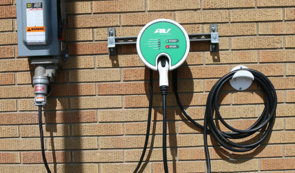 Electric vehicle Level 2 charging stations can be installed inside or outside a home. This one is installed outside. Register your electric vehicle with Benton REA before you install a Level 2 charger and receive $100