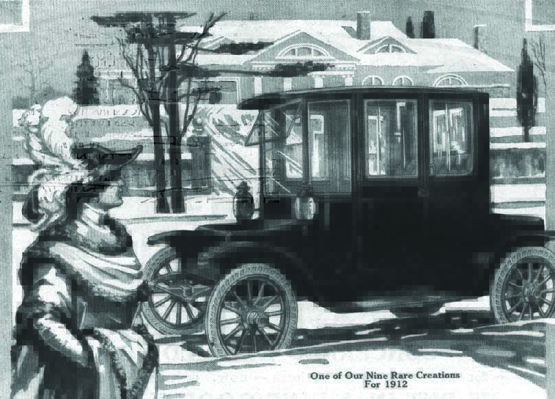 A Detroit Electric advertisement from 1912. Black and white illustration of a woman in a winter dress and hat standing by an electric car in a snowy neighborhood. The add says "One of Our nine Rare Creations For 1912"